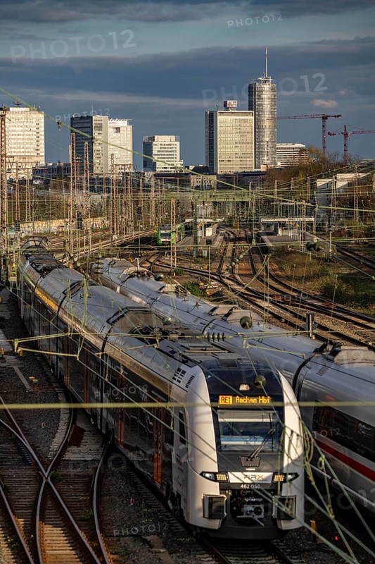 Train on the tracks west of Essen central station, city centre skyline, ICE and RRX, Rhine-Ruhr Express train, North Rhine-Westphalia, Germany, Europe