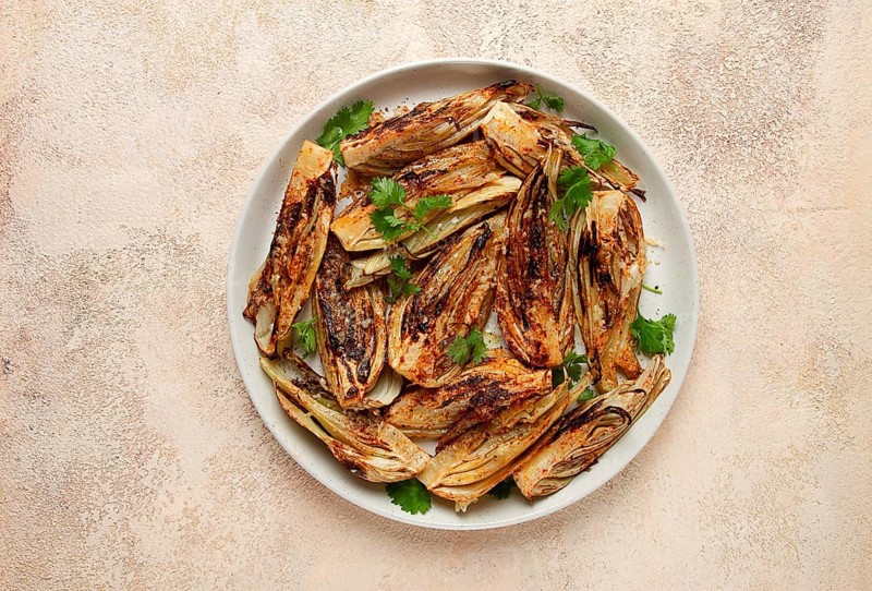 Baked, oven-baked fennel, with spices, in olive oil, homemade, no people