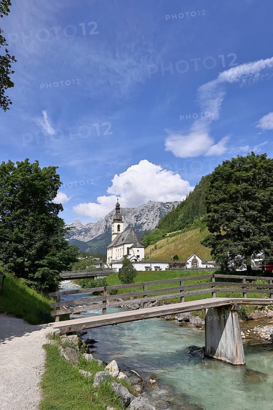 Parish church of St Sebastian with Ramsauer Ache, Reiteralpe in the background, Ramsau, Berchtesgaden, Berchtesgadener Land, Upper Bavaria, Bavaria, Germany, Europe