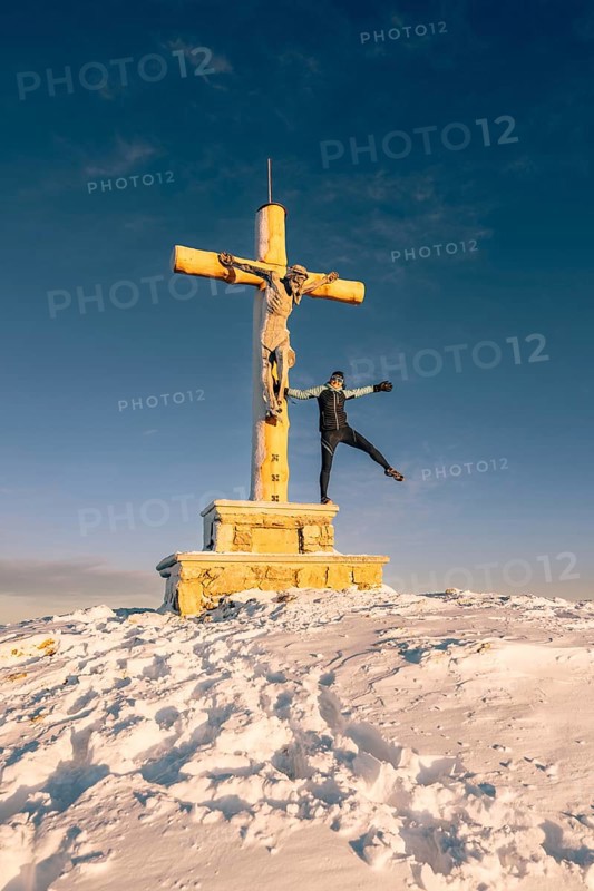 Summit bliss in the snow-covered winter landscape in the Tannheimer Tal in the Alps on the Neunerköpfle, Tyrol, Austria, Europe