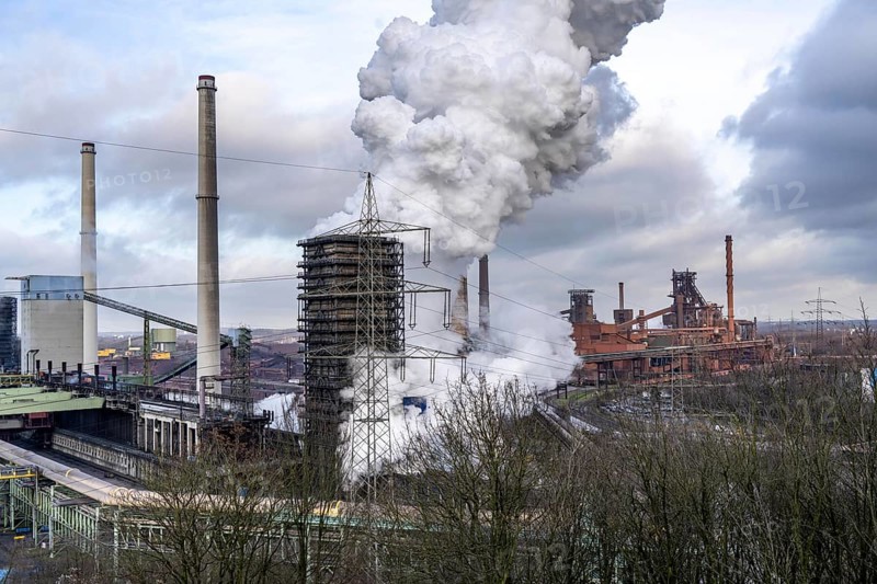 The Thyssenkrupp Steel steelworks in Duisburg-Marxloh, on the Rhine, quenching tower of the coking plant, blast furnaces 1 and 2, right, North Rhine-Westphalia, Germany, Europe