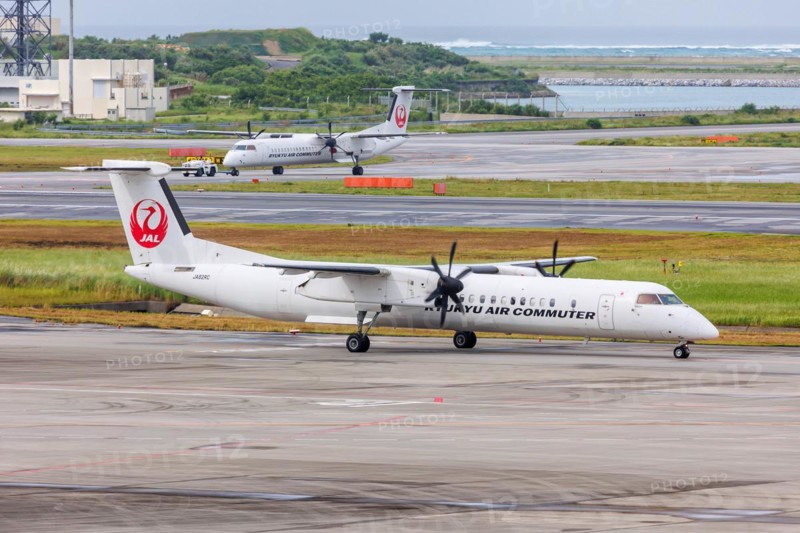 Dash 8 Q400 aircraft of Ryukyu Air Commuter with registration JA82RC at Okinawa Airport (OKA) in Naha, Japan, Asia
