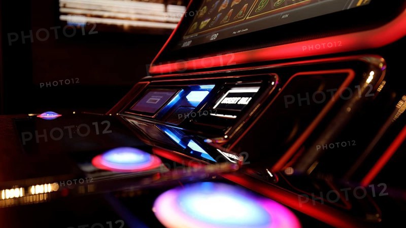 Person gambling on casino blackjack and slot machines on a cruise vacation