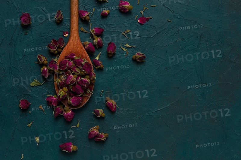 Pink Tea, Damask rose buds, wooden spoon, top view, no people