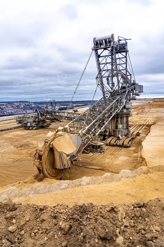 Opencast lignite mine Garzweiler 2, bucket wheel excavator 261 excavating the surface, near the rest of the hamlet of Lützerath, Erkelenz, North Rhine-Westphalia, Germany, Europe