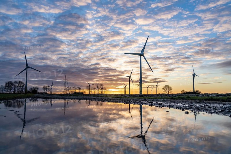 Wind farm near the East Frisian town of Norden, east of the town, sunset, Lower Saxony, Germany, Europe