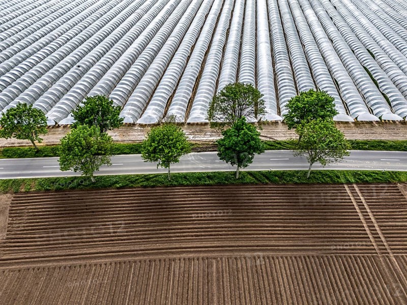 Agriculture, large areas with foil tunnel, for the cultivation of strawberries, freshly cultivated fields, south of Lövenich, belongs to Erkelenz, in the district of Heinsberg
