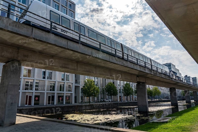 Ørestad district, youngest district of Copenhagen, on the island of Amager, planned in 1992 and still under construction, elevated railway line of the M1 metro line, Copenhagen, Denmark, Europe