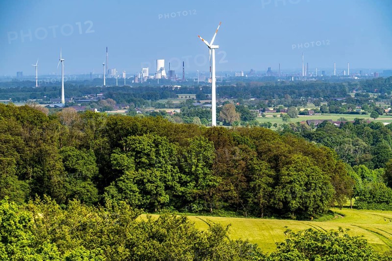 The Sonsbeck Switzerland, a part of the Lower Rhine mountain range, in the last cold period, ice age pushed up Stauch end moraine, with a height of 87 metres above sea level, view from Dürsberg in southeast direction in the background Duisburg with power plant Walsum and backdrop of the steel industry, Sonsbeck, North Rhine-Westphalia, Germany, Europe