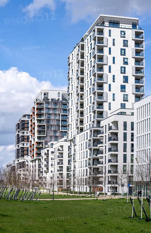 Modern residential district along Toulouser Allee, high-rise buildings with flats and offices, on former railway facilities, goods station, commercial areas, new tree planting North Rhine-Westphalia, Germany, Europe