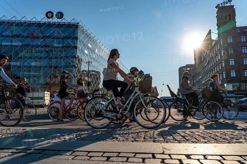 Cyclists on cycle paths, Radhuspladsen, City Hall Square, H.C. Andersen's Boulevard, in the city centre of Copenhagen, considered the cycling capital of the world, 45% of the population travel by bike, Denmark, Europe