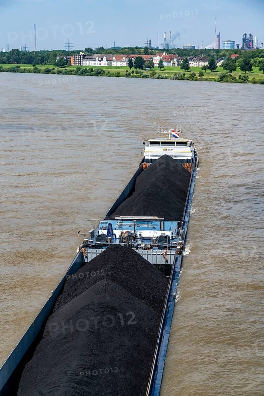 Inland shipping, Dutch cargo ship Privilege brings imported coal, steam coal, from Rotterdam to southern Germany, here on the Rhine at Ruhrort harbour, Duisburg, North Rhine-Westphalia, Germany, Europe
