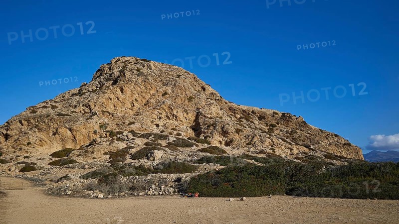 Rocky hill with sparse vegetation under a clear blue sky, Acropolis Hill, Arkasa, west coast, Karpathos, Dodecanese, Greek Islands, Greece, Europe