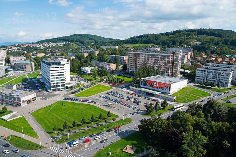 Panorama of the city centre with many cars and surrounding green areas under a blue sky, view from Batuv mrakodrap, Batas skyscraper over the city, Zlín, Zlin, Zlínský kraj, Moravia, Czech Republic, Europe