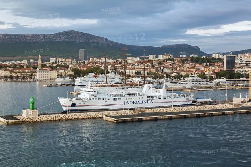 White blue and red Jadrolinija Oliver ferry boat docked at terminal in Port of Split in late summer, Croatia, Europe