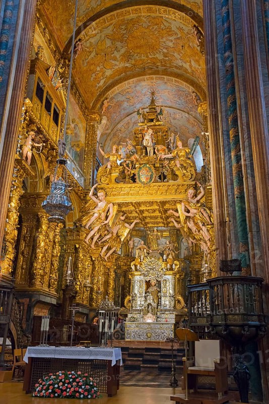 Gold-decorated Baroque church interior with an ornately decorated altar and angels, cathedral, Santiago de Compostela, autonomous community of Galicia, place of pilgrimage, destination of the Way of St James, Spain, Europe