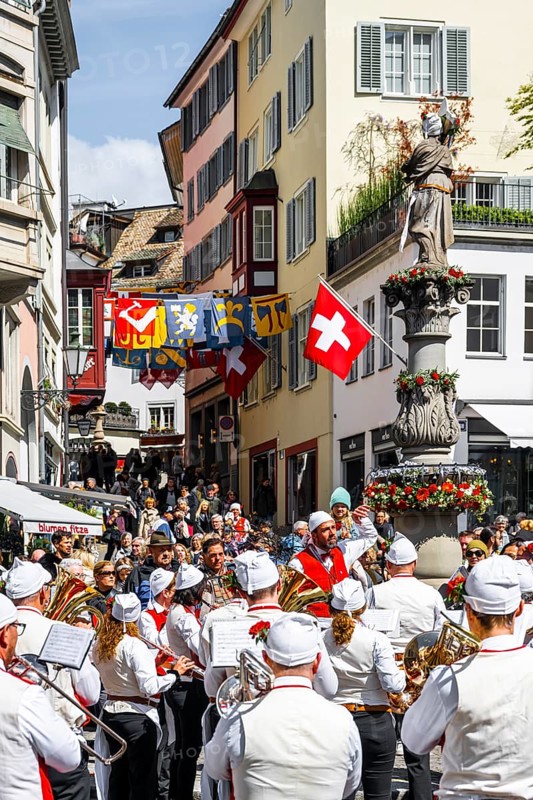 Historically costumed guildsmen in Zurich's Old Town, stand concert at Münzplatz, Zunft zum Weggen, Sechseläuten or Sächsilüüte, Zurich Spring Festival, Zurich