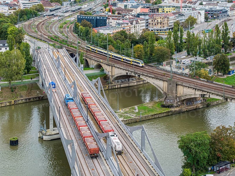 Load test on the Neckar Bridge, aerial view. Due to the unusual design, dimensional checks are mandatory in front of the bridge is opened to trains. Two goods trains with a combined weight of 960 tonnes load the 345 metre long bridge over the Neckar. Local train. The bridge is part of the major Stuttgart 21 project. Stuttgart, Baden-Württemberg, Germany, Europe