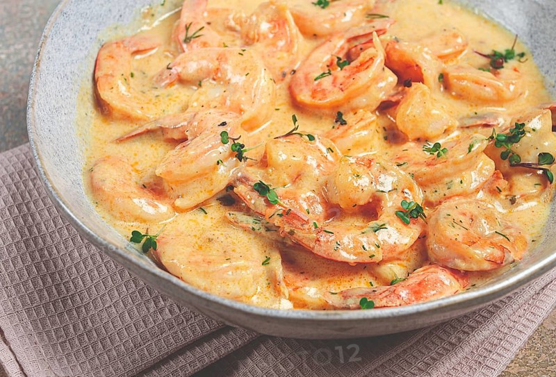 Shrimp in creamy garlic sauce, with spices and herbs