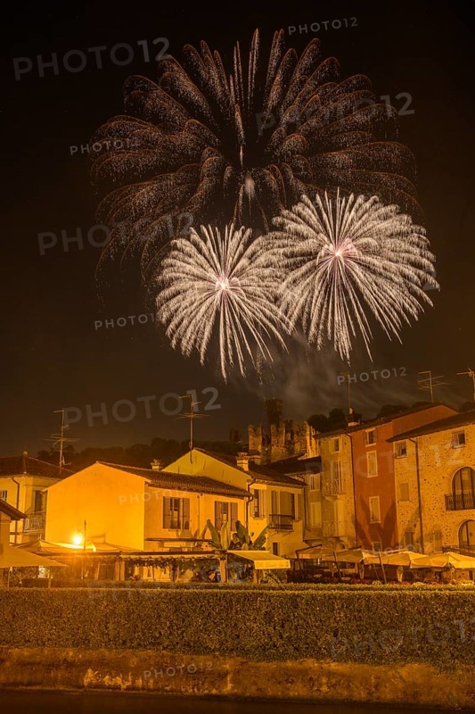 Fireworks from the Scaliger castle in the foreground Houses of, Borghetto, Valeggio sul Mincio, Province of Verona, Italy, Europe