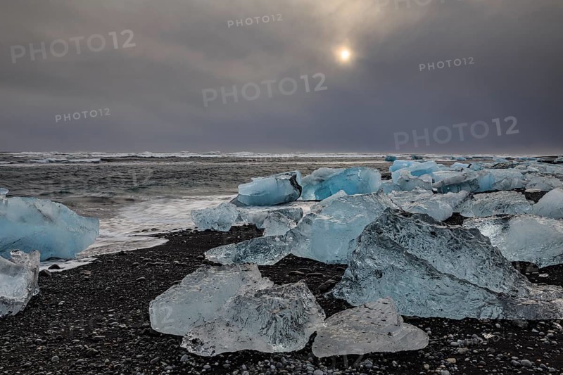 Ice floes on the beach, waves, sea, clouds, sunlight, winter, Diamond Beach, Breidamerkursandur, Jökulsarlon, Iceland, Europe