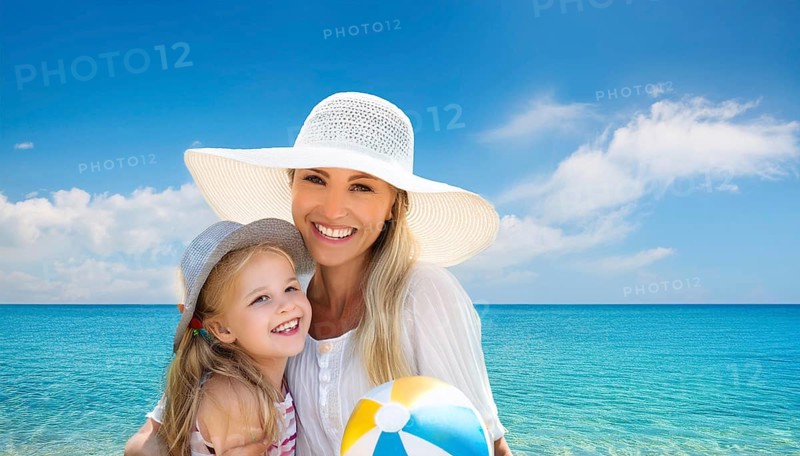 An attractive young woman with her daughter on the beach in the Caribbean, Studio
