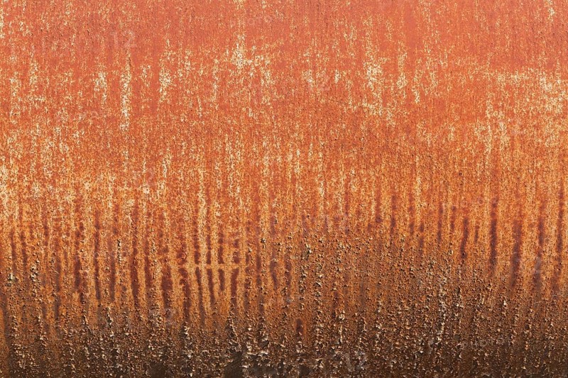 Close-up of cylindrical metal surface with rust stains and streaks, Quebec, Canada, North America