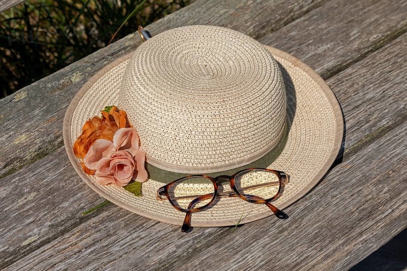 Straw hat and glasses lying on a bench, circular hiking trail, Darßer Ort, Born a. Darß, Mecklenburg-Vorpommern, Germany, Europe