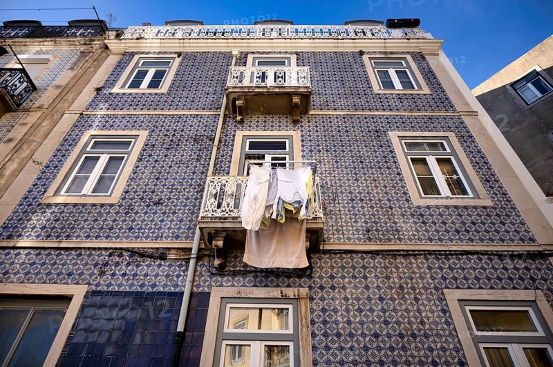 House, house facade, azulejos, tiles, tile decoration, laundry for drying, balcony, Lisbon, Portugal, Europe