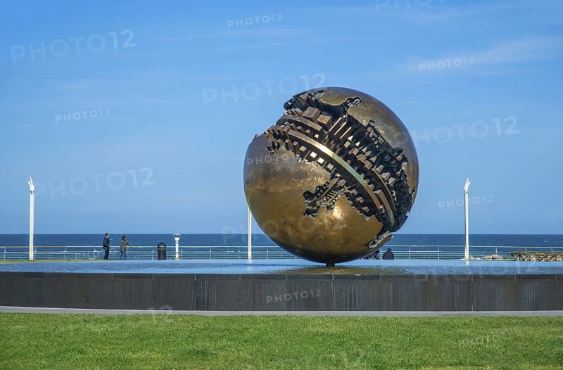 Sfera Grande, sculpture by the artist Arnaldo Pomodoro on the promenade in Pesaro, Marche region, Italy, Southern Europe, Europe