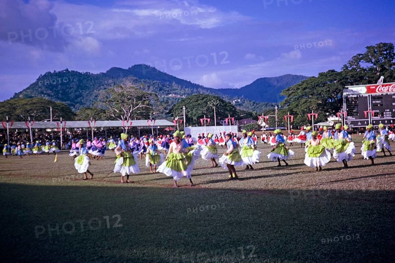 Colourful young female dancers, Port of Spain, Trinidad c 1962 independence pageant