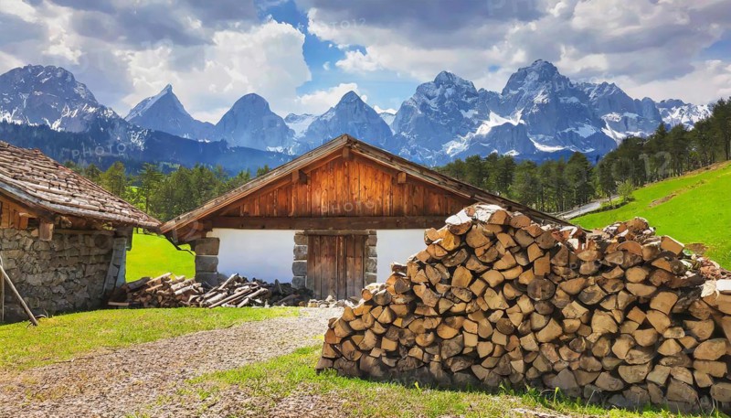 Forestry, timber industry, firewood stacked in front of a farmhouse, AI generated, AI generated