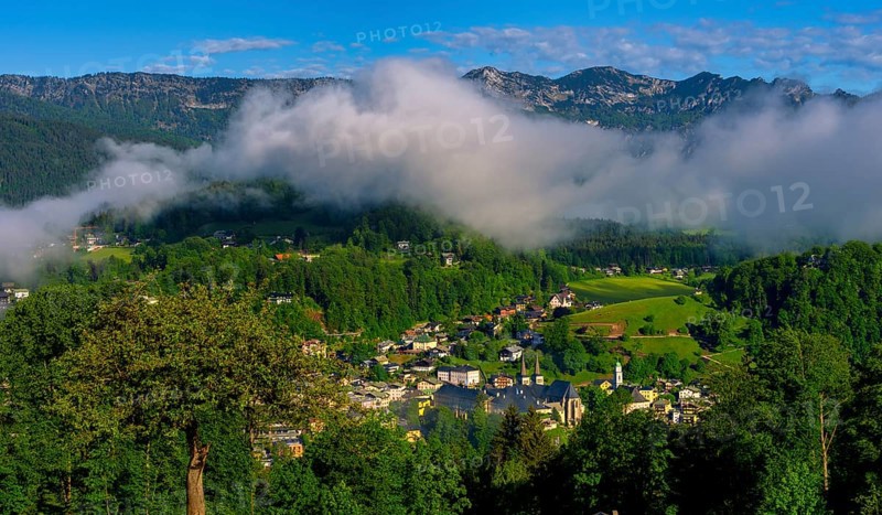 Morning fog over the village of Berchtesgaden in the valley, Berchtesgaden National Park, Upper Bavaria, Germany, Europe