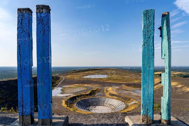 The Haniel spoil tip, 185 metre high spoil tip, at the Prosper Haniel mine, which was closed in 2019, artwork Totems by the sculptor Augustin Ibarrola, mountain arena, amphitheatre, Bottrop, Germany, Europe