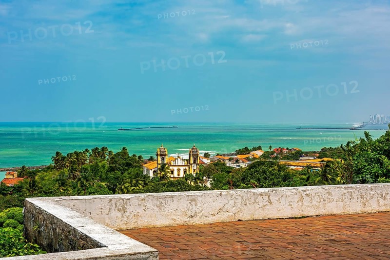 Historic city of Olinda in Pernambuco seen from the courtyard of the old church with the sea in the background, Olinda, Pernambuco, Brazil, South America