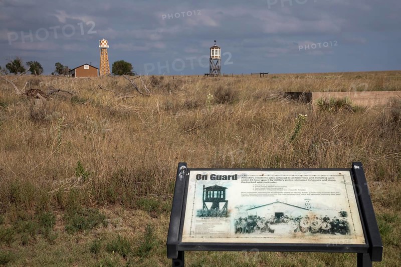 Granada, Colorado, The World War II Amache Japanese internment camp in southeast Colorado. More than 7, 000 Japanese and Japanese-Americans were held at the site, one of 10 internment camps in the American west. Though all the buildings were demolished after the war, many barracks foundations remain. A guard tower, water tower, and one barracks have been reconstructed