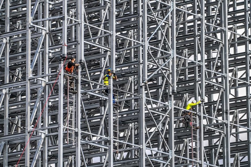 Construction of a high-bay warehouse, storage system for high space utilisation, in steel construction, North Rhine-Westphalia, Germany, Europe
