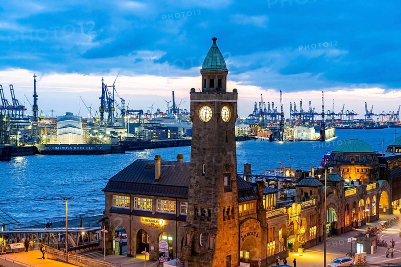 Port of Hamburg, view over the St. Pauli Landungsbrücken, Pegelturm, to the Blohm + Voss shipyard, in the evening, cranes of the container terminals, Hamburg Germany