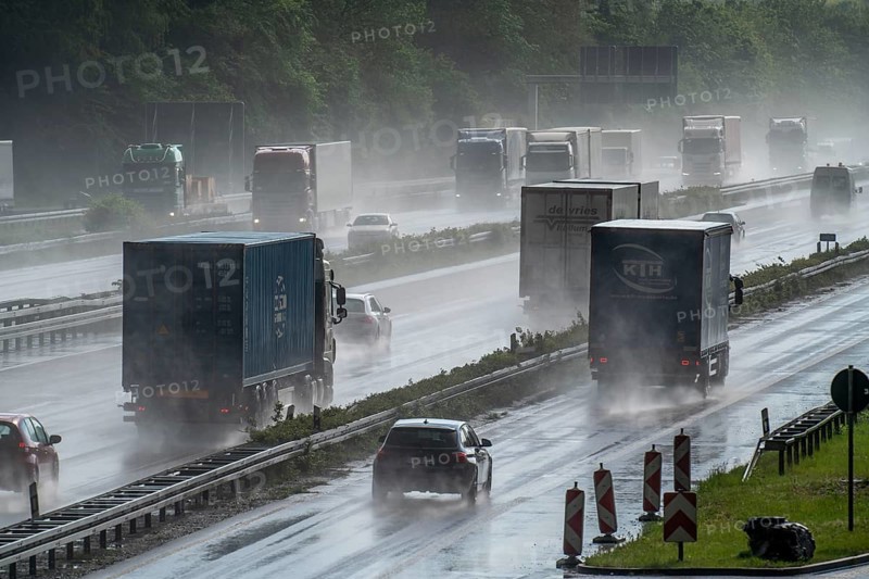 A2 motorway, at Recklinghausen motorway junction, heavy traffic during a thunderstorm, North Rhine-Westphalia, Germany, Europe
