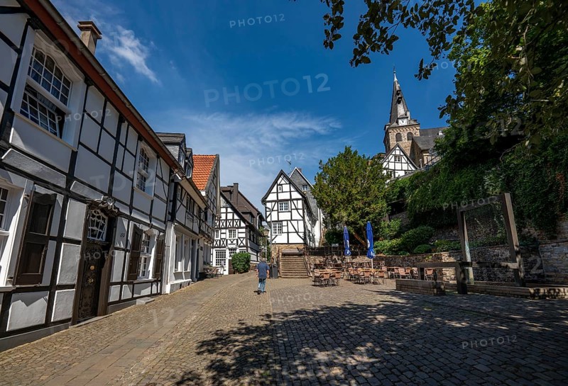 The old town centre of Essen-Kettwig, Ruhrstrasse, church steps, market church, Weberbrunnen fountain Essen North Rhine-Westphalia, Germany, Europe