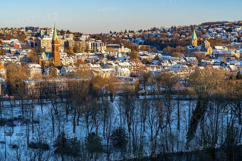 View over the Werden district of Essen, in front the Brehminsel, The Protestant Church in Essen-Werden, left, behind it the Protestant Hospital Werden, on the right St. Ludgerus Church, Winter, Essen North Rhine-Westphalia, Germany, Europe