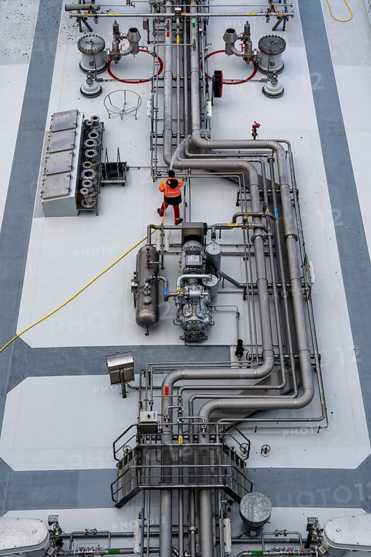 Gas tanker, Brinjal, transports butane gas to the petrochemical company INEOS in Cologne, ship's personnel clean the deck, cargo ship on the Rhine North Rhine-Westphalia, Germany, Europe