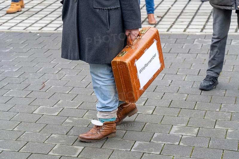 Suitcase march in Recklinghausen, for the 2nd time over 500 people walk through Recklinghausen, carrying suitcases with the inscription #WeRemember, in memory of the deportation of 216 Jews in the Nazi era in RE, on the day in front of the International Holocaust Remembrance Day, to the synagogue, followed by a memorial service, the names of the deported people are written on the pillars, North Rhine-Westphalia, Germany, Europe