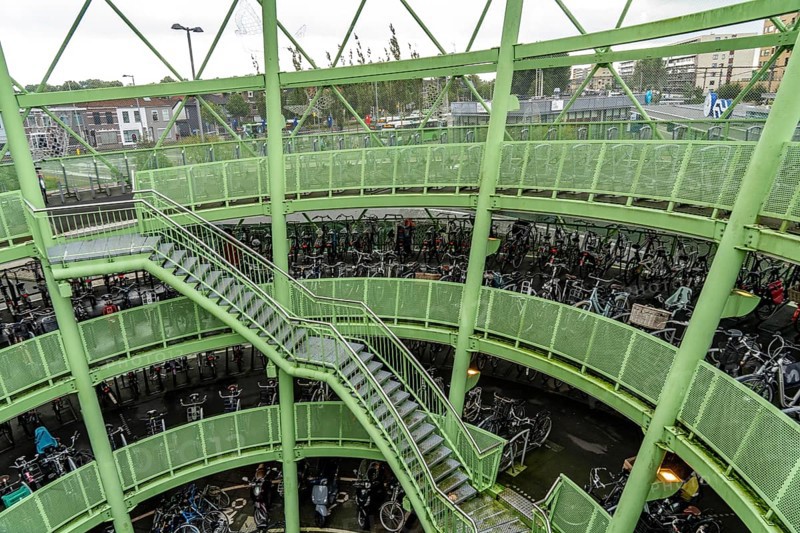 The Fiestappel, bicycle car park for over 900 bicycles, in a stylised apple shape, in Alphen aan den Rijn, directly at the railway and bus station, as well as on a central cycle path, Netherlands