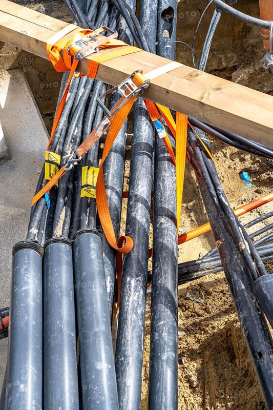 Supply lines, laid underground, exposed during a construction project, Bochum, North Rhine-Westphalia, Germany, Europe