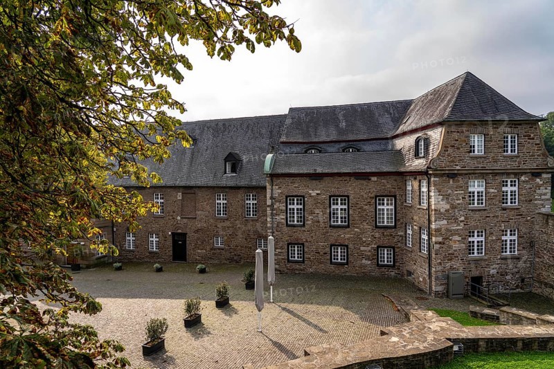 Broich Castle on the west bank of the Ruhr near the city centre, the fortification is in parts the oldest preserved early medieval fortification from the late Carolingian period north of the Alps, today a museum and event location, in Mülheim an der Ruhr, North Rhine-Westphalia, Germany, Europe