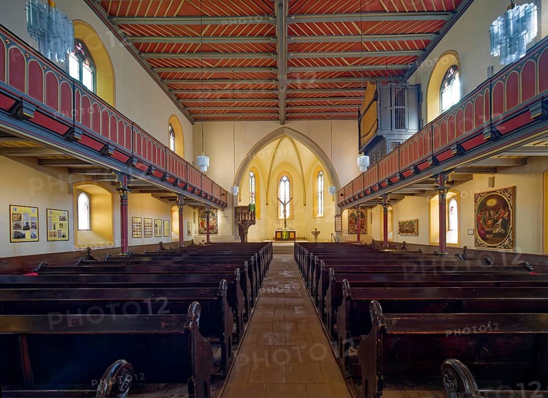 Late Gothic Protestant-Lutheran town church of St Peter with pulpit, altar, crucifix and baptismal font, interior view, market square, old town centre of Eisenberg, Saale-Holzland district, Thuringia, Germany, Europe