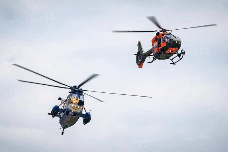 A Sea King MK41 multi-purpose helicopter and an H145 search and rescue helicopter, photographed as part of an air show at the ILA Berlin Air Show in Berlin, 7 June 2024.y