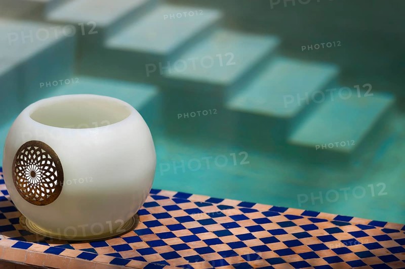 Oriental decoration in a riad, wellness, decorated, Arabic, oriental, Orient, tiles, lamp, tea light, stairs, bathroom, pool, water basin, Mediterranean, warm tones, warm colours, Morocco, Africa