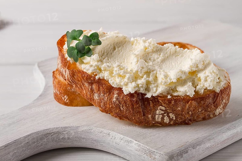 Sandwich, with cream cheese, homemade, on a cutting board, rustic style, no people, selective focus, breakfast